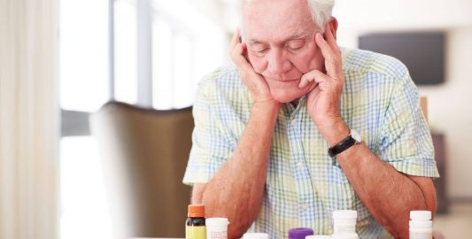 A Man Sitting At A Table
