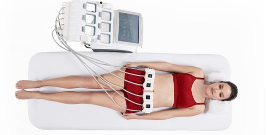 Woman With Trusculptid Machine