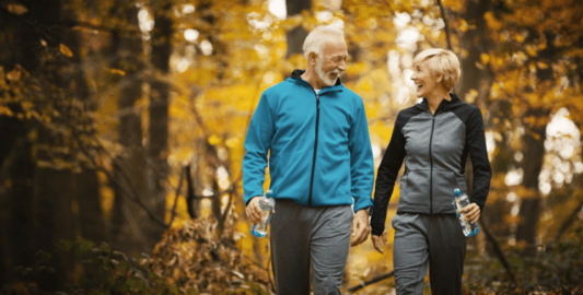 A Person Standing Next To A Tree