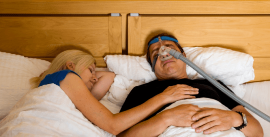 A Person Lying On A Bed