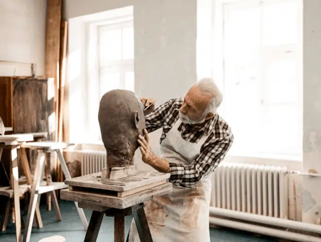 Man pursuing his passion in sculpting