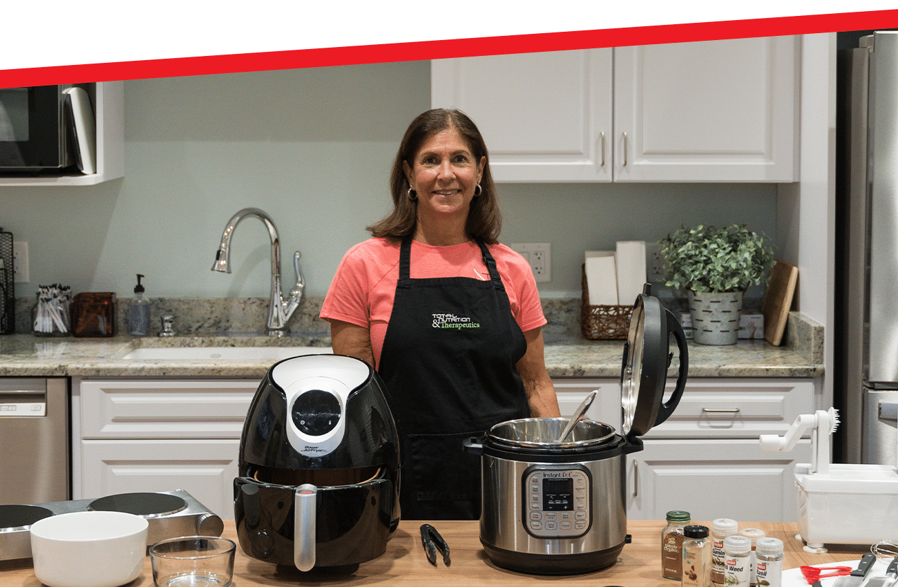 a person standing in front of a stove