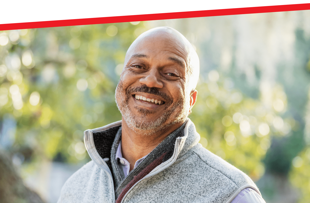 a man smiling for the camera