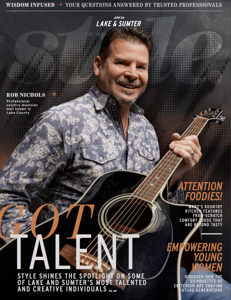 a man holding a guitar a man holding a guitar